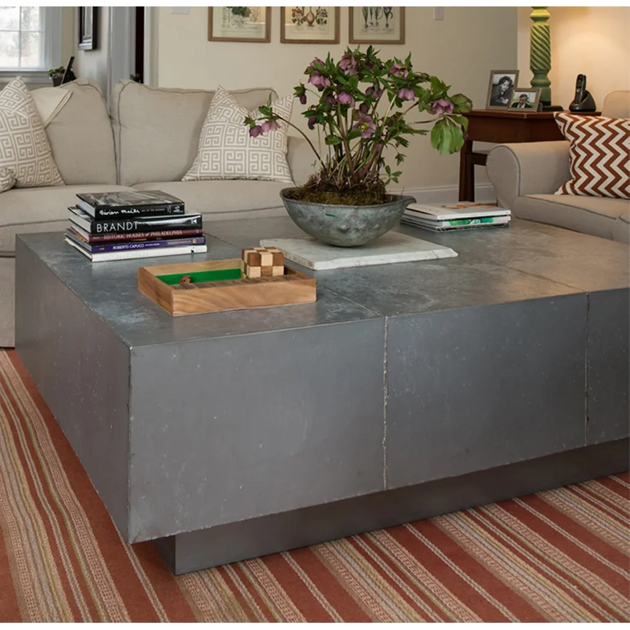 Zinc table detail showing aged patina finish
